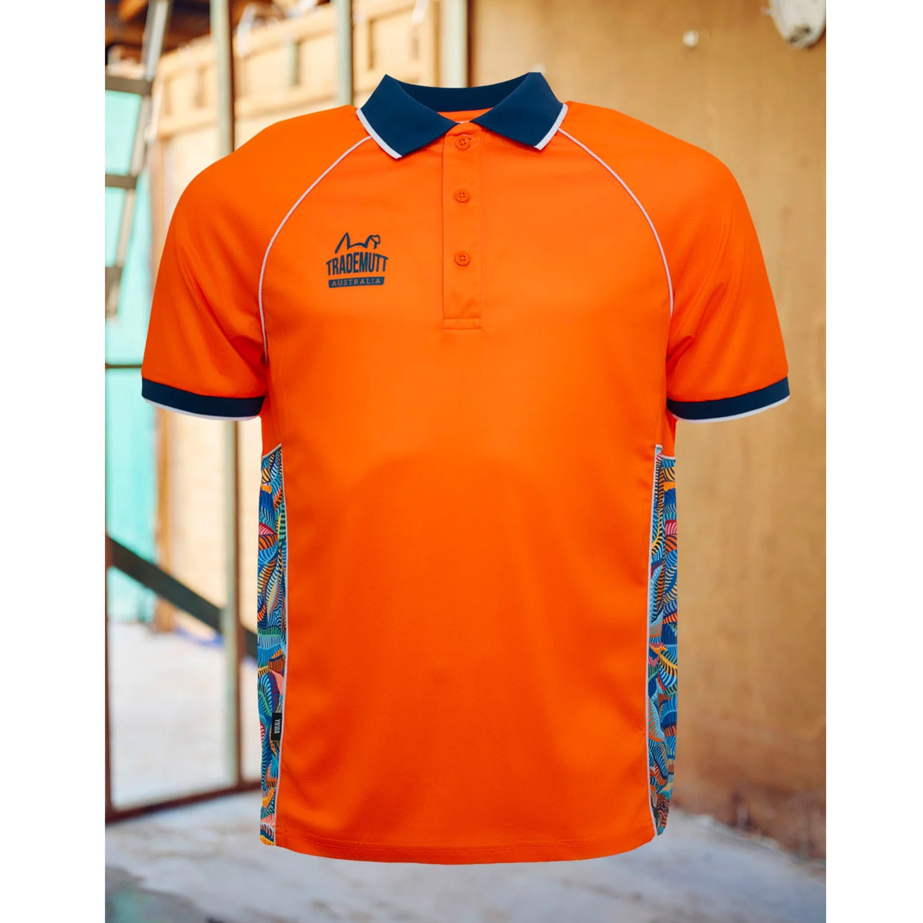 trademutt snazzy orange polo